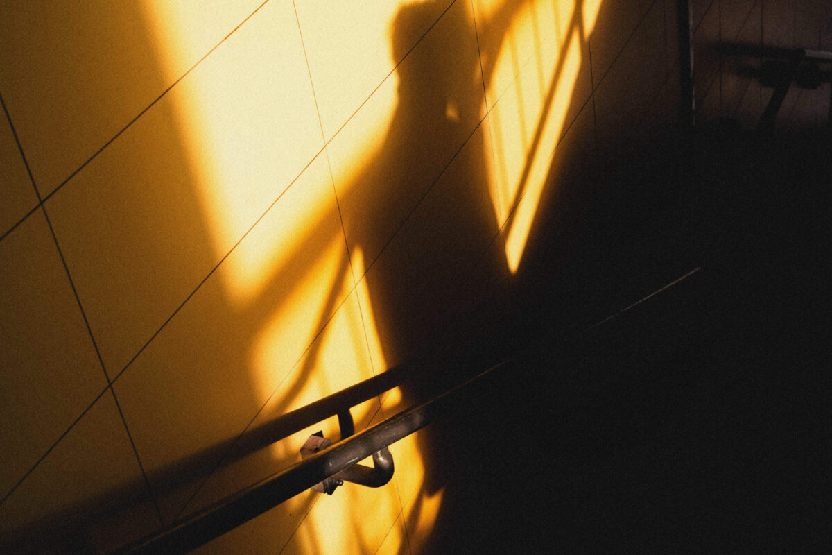 street photograph of a shadow in berlin made on a fixed focal length lense