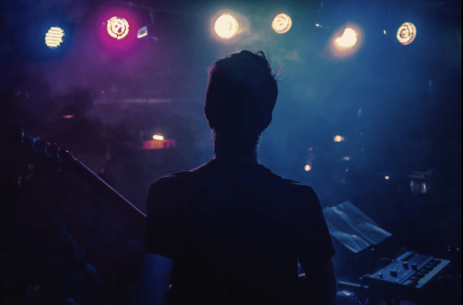 Guitarist on stage shot by music photographer in Vienna