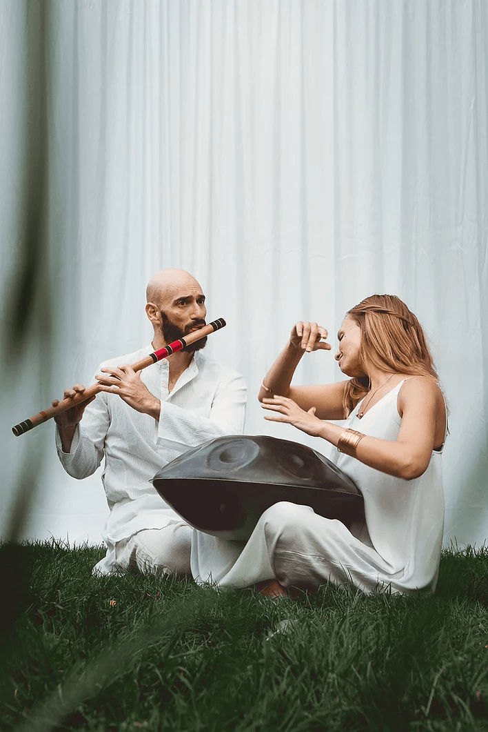 Staged photography of musicians playing on instruments