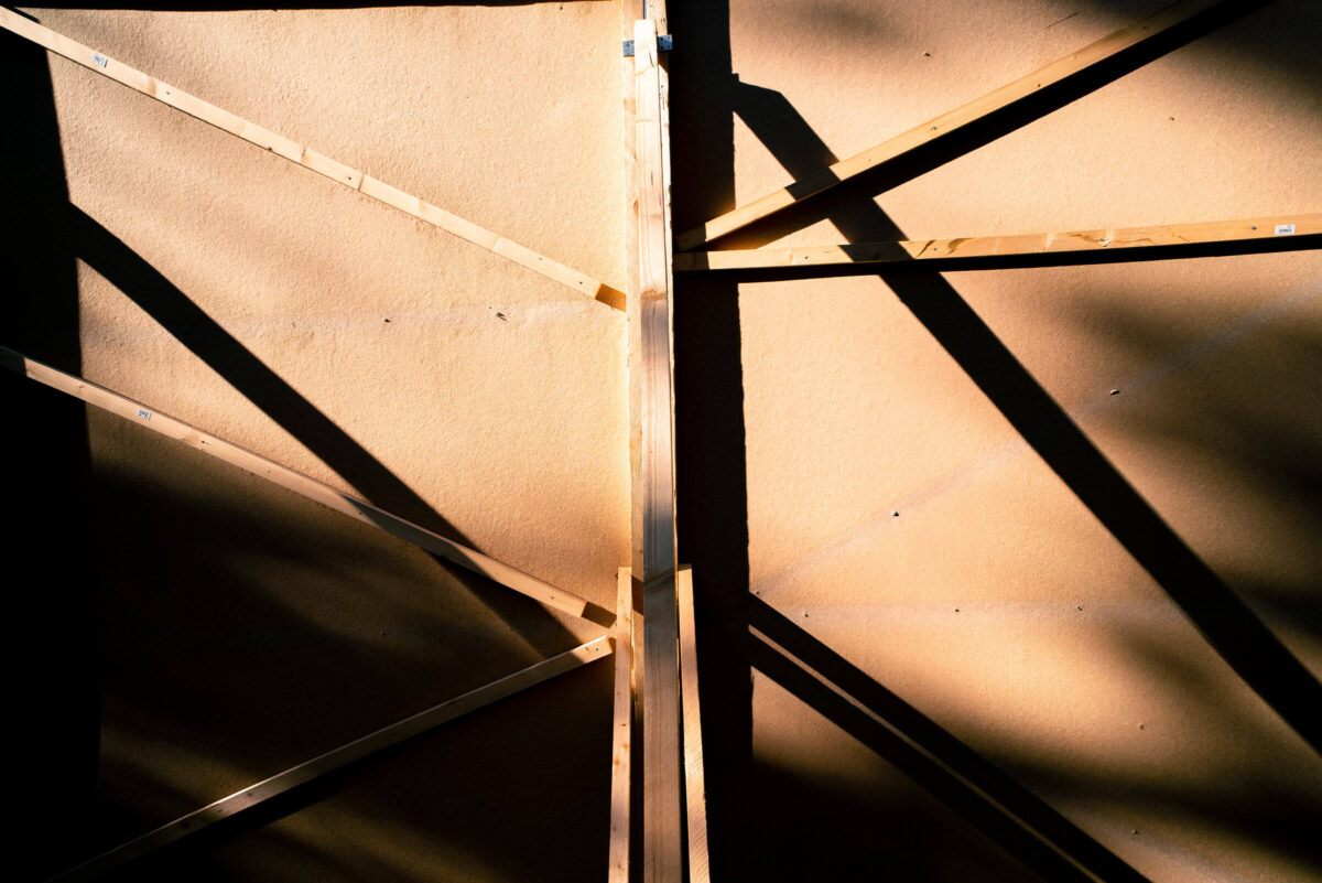 shot with a closed aperture of a wooden board on a sunny day