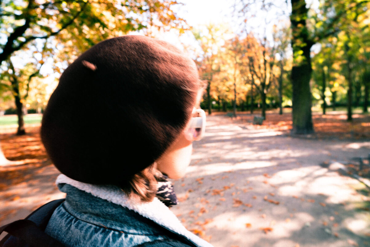 A woman in a park on a sunny day
