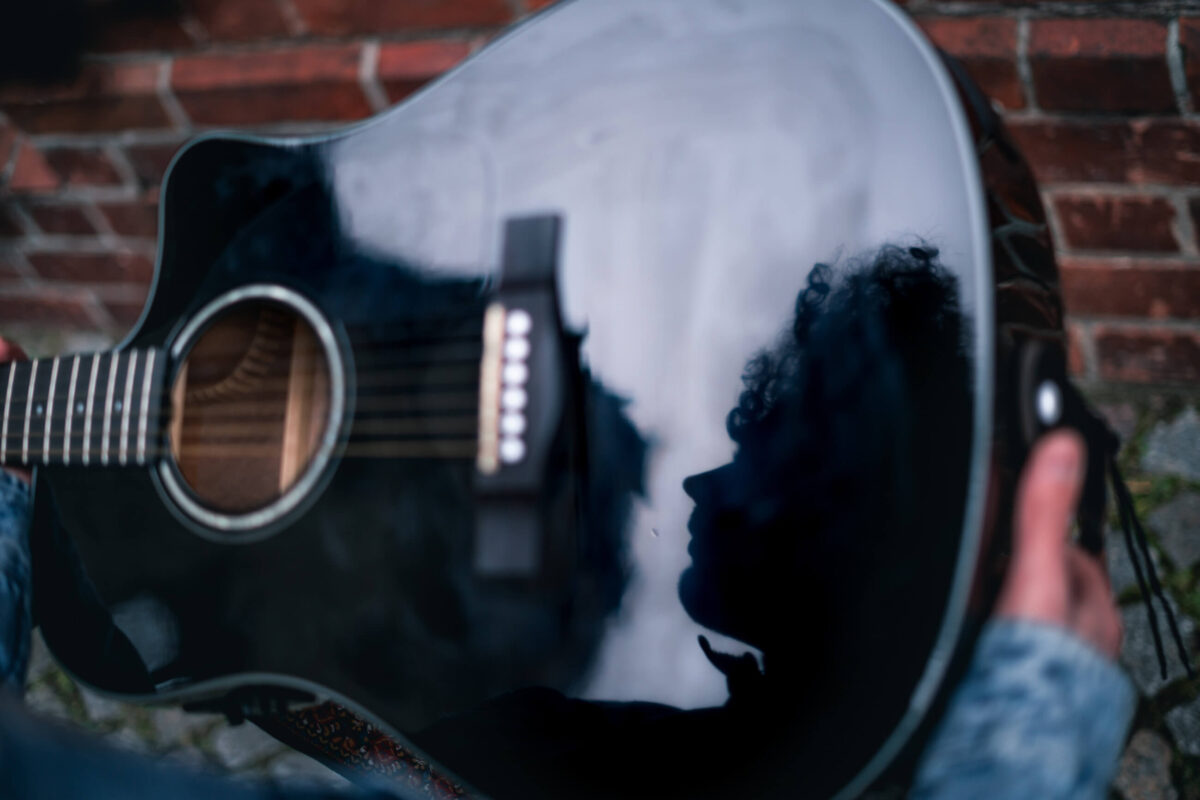 Music portrait photographer in Vienna a silhouette of a musician in a guitar