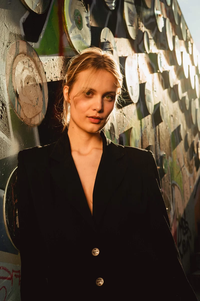 Portrait of a young woman on a street of Berlin
