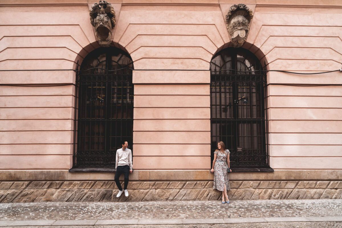 Portrait photograph in Berlin of two people sitting on windowsills
