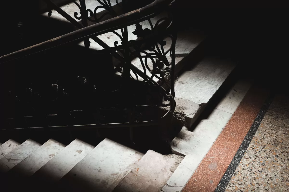 An old staircase with a dramatic light