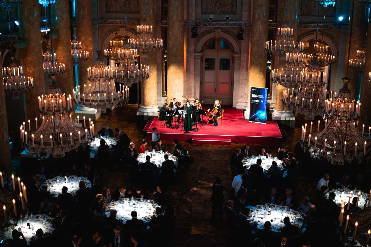 Musicians on a stage at Hofburgs event hall giving concert at the beginning of a gala dinner