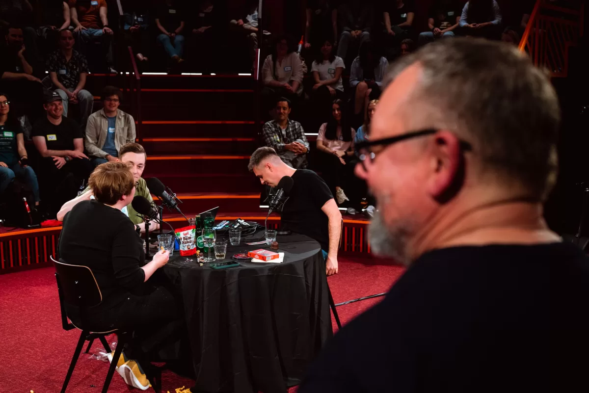 moody photo with speakers getting ready for an event by Fedor Vasilev