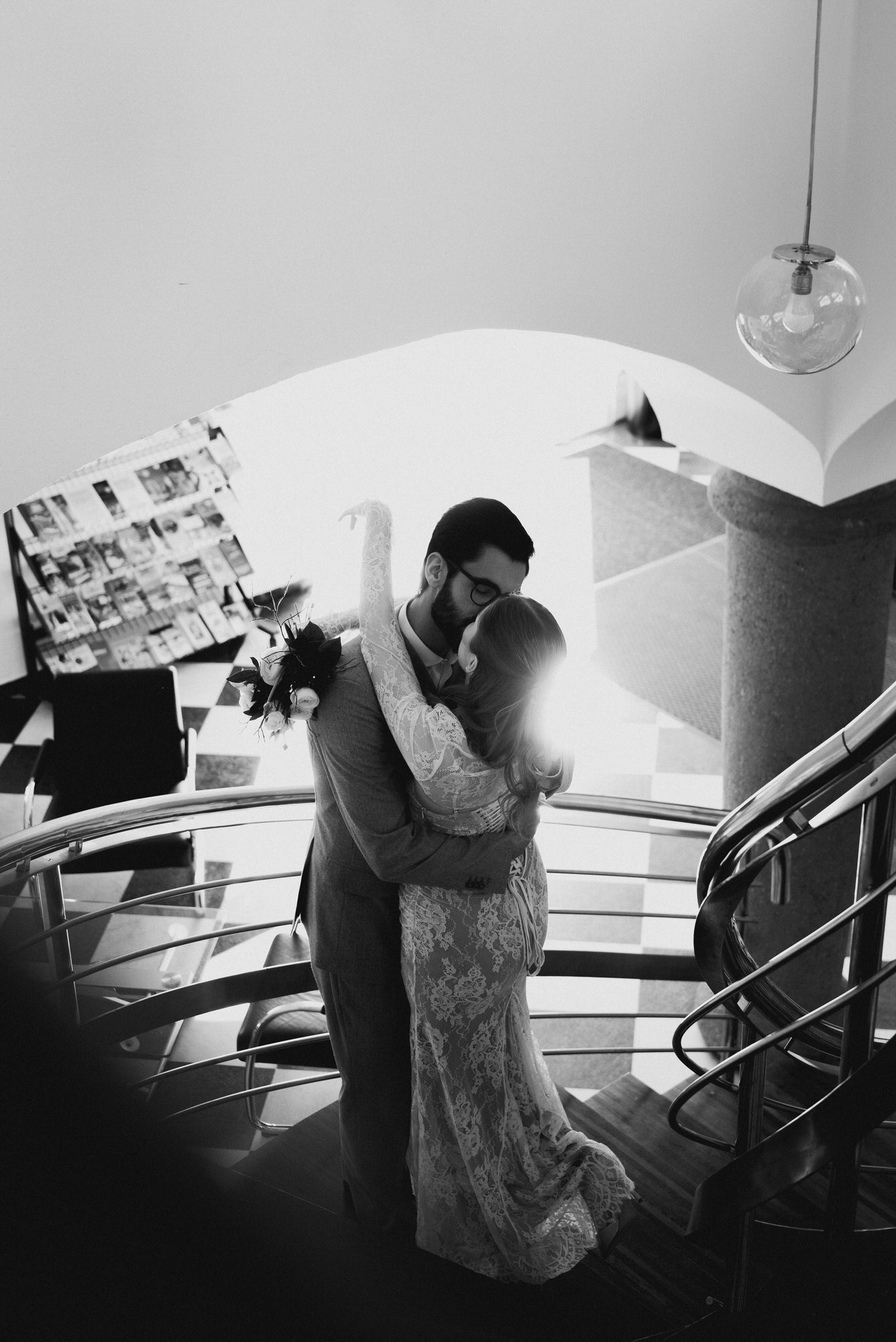 the couple kissing in the registry office hall