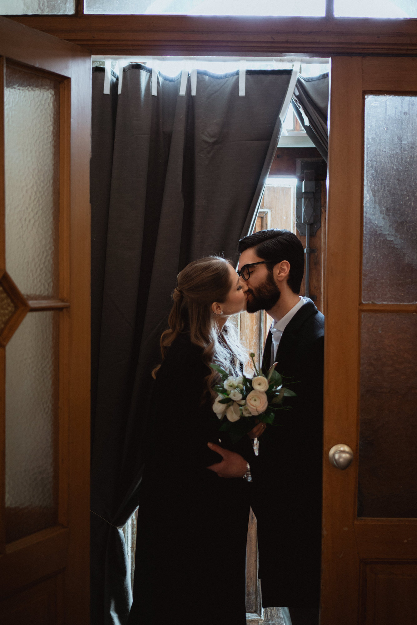 newlyweds kiss in a chirch