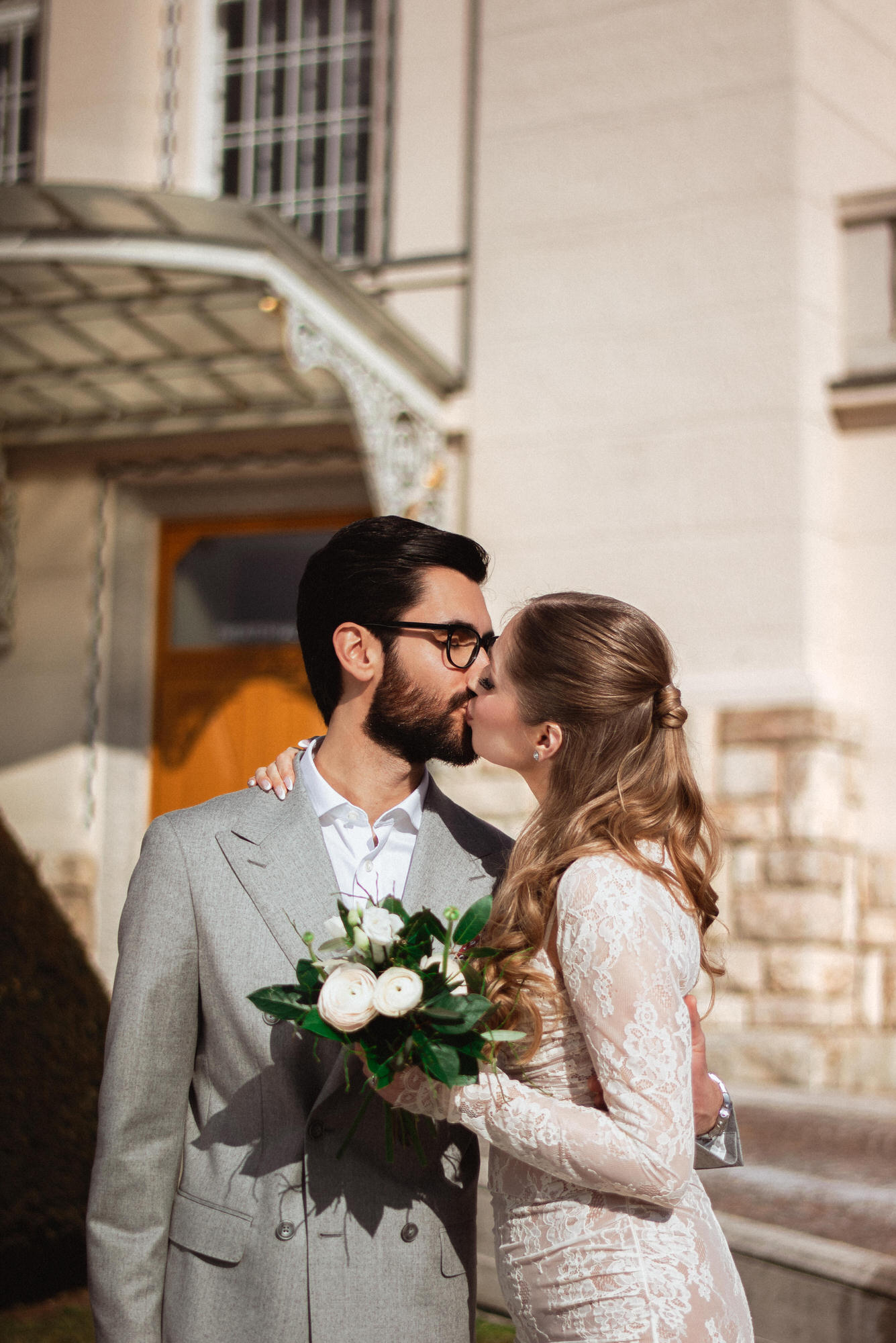 Newlyweds kissing on a street in austria